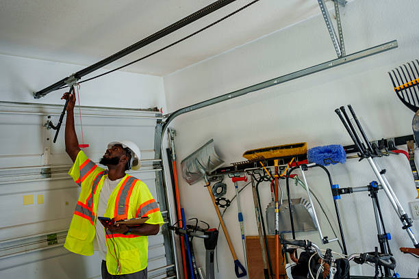 Professional Garage Door Panel Replacement technician working in Roselawn, IN
